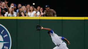 SEATTLE, WA - JUNE 23: Center fielder Lorenzo Cain #6 of the Kansas City Royals makes a running catch on a ball off the bat of Dustin Ackley of the Seattle Mariners in the seventh inning at Safeco Field on June 23, 2015 in Seattle, Washington. (Photo by Otto Greule Jr/Getty Images)