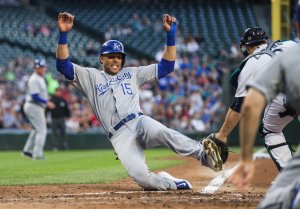 Kansas City's Alex Rios beats the throw home to Seattle catcher Mike Zunino, scoring on the bases-clearing 3-run RBI double by Omar Infante. Kansas City scored 7-runs in the inning. The Kansas City Royals played the Seattle Mariners Wednesday, June 24, 2015, at Safeco Field in Seattle.