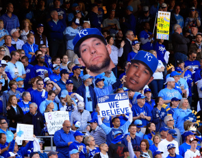 KANSAS CITY, MO - OCTOBER 15:  Kansas City Royals Fans hold up giant heads of Alex Gordon #4 and Salvador Perez #13 of the Kansas City Royals in the stands during Game Four of the American League Championship Series against the Baltimore Orioles at Kauffman Stadium on October 15, 2014 in Kansas City, Missouri.  (Photo by Jamie Squire/Getty Images)