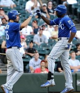 Kansas City Royals' Lorenzo Cain, right, celebrates with teammate Eric Hosmer after hitting a solo home run during the 13th inning of a baseball game against the Chicago White Sox, Saturday, July 18, 2015, in Chicago. The Royals won 7-6. (AP Photo/Nam Y. Huh)