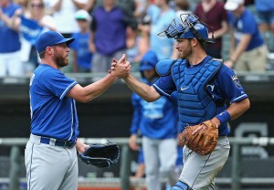CHICAGO, IL - JULY 17:  Greg Holland #56 of the Kansas City Royals (L) is congratulated by Drew Butera #9 after a win over the Chicago White Sox at U.S. Cellular Field on July 17, 2015 in Chicago, Illinois. The Royals defeated the White Sox 4-2.  (Photo by Jonathan Daniel/Getty Images)