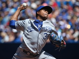 TORONTO, CANADA - AUGUST 2: Edinson Volquez #36 of the Kansas City Royals delivers a pitch in the first inning during MLB game action against the Toronto Blue Jays on August 2, 2015 at Rogers Centre in Toronto, Ontario, Canada. (Photo by Tom Szczerbowski/Getty Images)