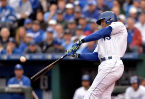 Apr 6, 2015; Kansas City, MO, USA; Kansas City Royals right fielder Alex Rios (15) connects for a two run home run in the seventh inning against the Chicago White Sox at Kauffman Stadium. Mandatory Credit: Denny Medley-USA TODAY Sports