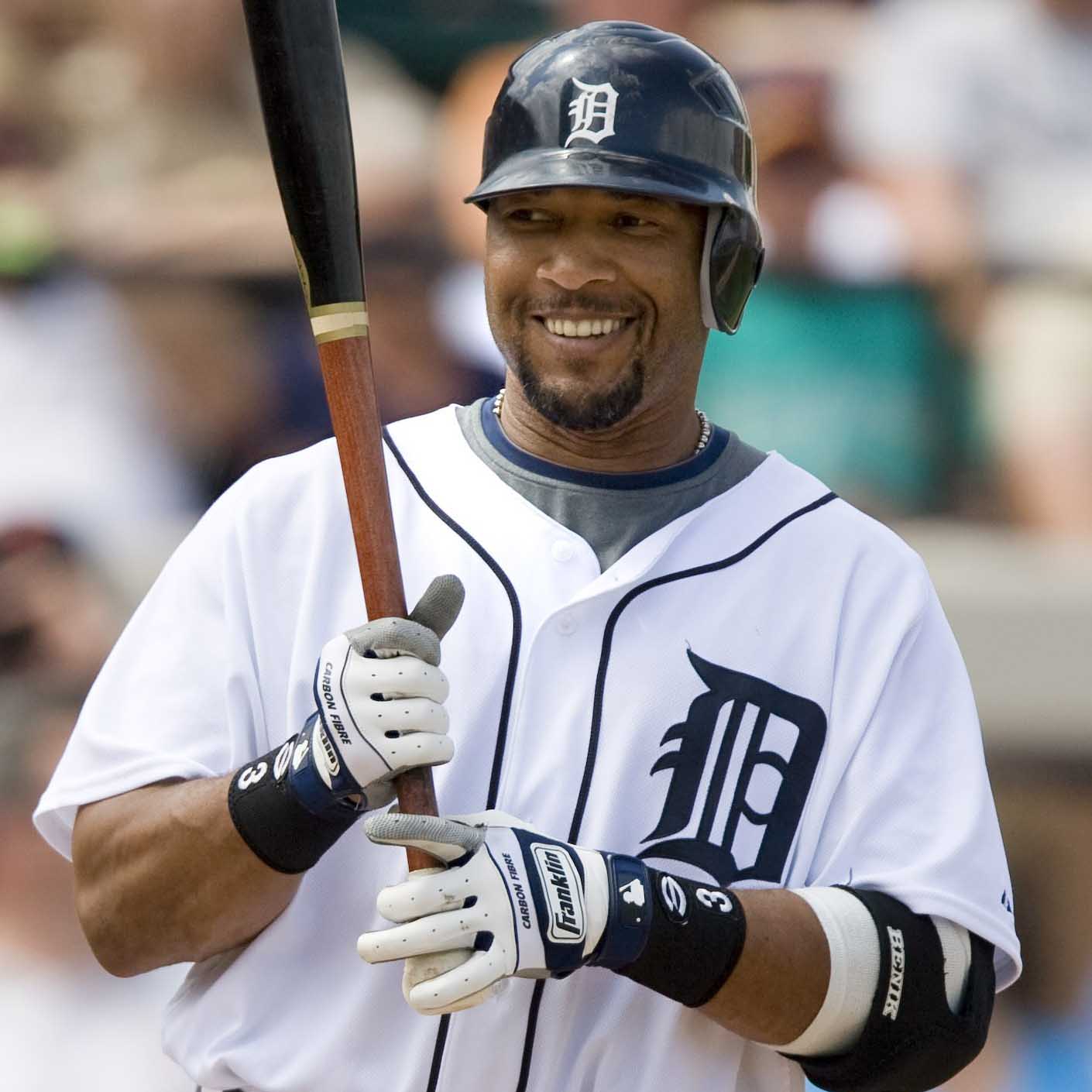 Detroit Tigers' Sheffield laughs with Washington Nationals catcher Nieves during spring training baseball game in Lakeland, Florida